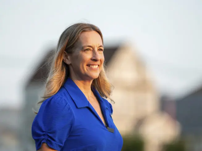 Rep. Mikie Sherrill, D-N.J., walks along Veterans Memorial Field during the Kearny's Independence Day celebration getting residents.