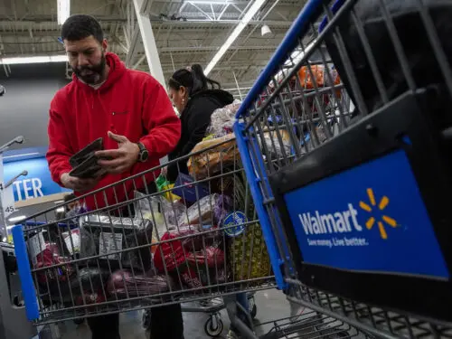 Francisco Santana shops at the Walmart Supercenter in North Bergen, New Jersey, on Thursday, Feb. 9, 2023.