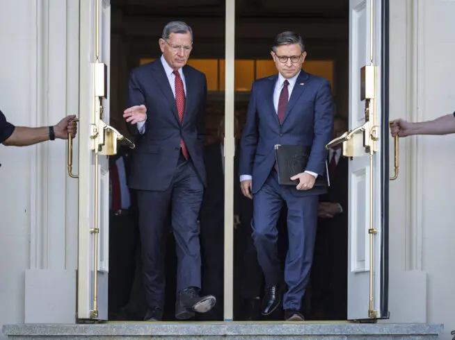Sen. John Barrasso, R-Wyoming, the Senate GOP whip, left, and Speaker of the House Mike Johnson, R-Louisiana, right, arrive for a news conference with top Republicans on the government shutdown, at the Capitol in Washington, Wednesday, Oct. 1, 2025